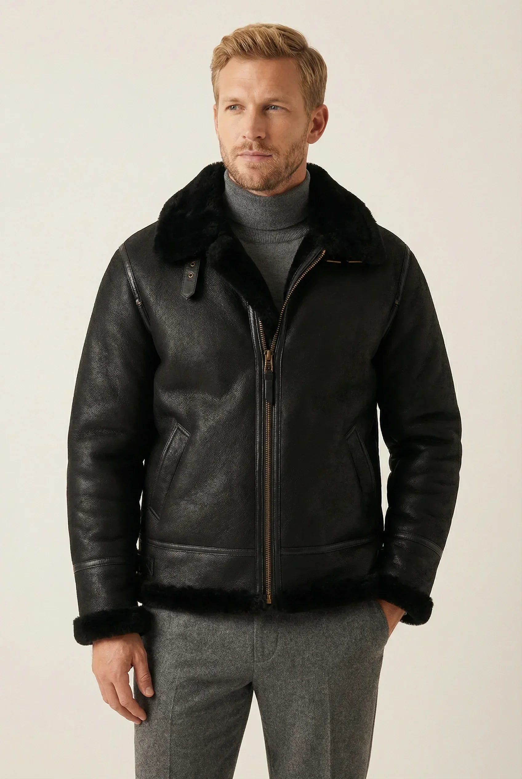 Shearlord classic black B-3 bomber jacket displayed in a soft neutral studio setting with a matte finish.