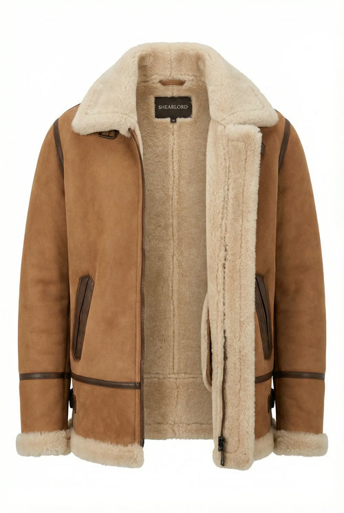 Whiskey cream Shearlord B-3 bomber jacket with plush beige shearling lining, unzipped on a white background.
